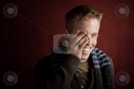 To use this stock image in your creative project, please select the size you need over to the right and click the "Add to Cart" button.
Your downloaded image will come with the Cutcaster watermark removed so don’t worry about the watermark you see on this page. Young man covering his face stock photo, Young man covering face with his hand by Scott Griessel