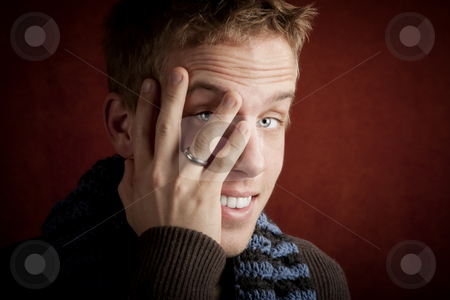 To use this stock image in your creative project, please select the size you need over to the right and click the "Add to Cart" button.
Your downloaded image will come with the Cutcaster watermark removed so don’t worry about the watermark you see on this page. Young man covering his face stock photo, Young man covering face with his hand by Scott Griessel