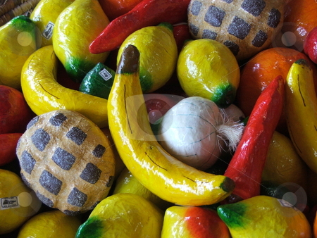To use this stock image in your creative project, please select the size you need over to the right and click the "Add to Cart" button.
Your downloaded image will come with the Cutcaster watermark removed so don’t worry about the watermark you see on this page. Colorful fakes stock photo, A bin full of fake vegetables and fruit is a colorful attention grabber in a Scottsdale, Arizona tourist shop. by Dennis Thomsen
