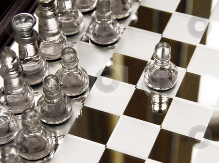 To use this stock image in your creative project, please select the size you need over to the right and click the "Add to Cart" button.
Your downloaded image will come with the Cutcaster watermark removed so don’t worry about the watermark you see on this page. Chessboard stock photo, Glass chessboard with first beginning position of pawn by Julija Sapic
