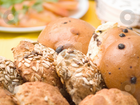 To use this stock image in your creative project, please select the size you need over to the right and click the "Add to Cart" button.
Your downloaded image will come with the Cutcaster watermark removed so don’t worry about the watermark you see on this page. Delicious home made bread rolls stock photo, Delicious home made bread rolls on table by Phillip Dyhr Hobbs
