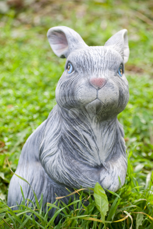 To use this stock image in your creative project, please select the size you need over to the right and click the "Add to Cart" button.
Your downloaded image will come with the Cutcaster watermark removed so don’t worry about the watermark you see on this page. Rabbit statue stock photo, Rabbit statue on green grass backgound by Desislava Dimitrova