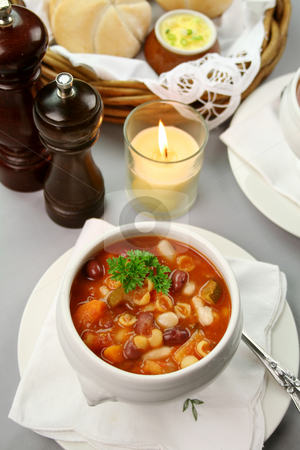 To use this stock image in your creative project, please select the size you need over to the right and click the "Add to Cart" button.
Your downloaded image will come with the Cutcaster watermark removed so don’t worry about the watermark you see on this page. Minestrone Soup stock photo, Delicious minestrone soup with fresh baked bread rolls and butter. by Brett Mulcahy