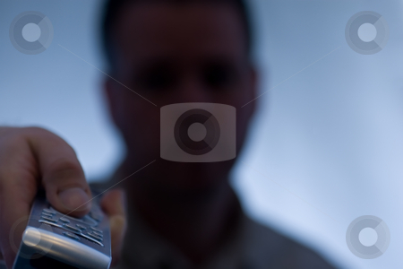 To use this stock image in your creative project, please select the size you need over to the right and click the "Add to Cart" button.
Your downloaded image will come with the Cutcaster watermark removed so don’t worry about the watermark you see on this page. Remote control suprise stock photo, Man pointing remote with look of surprise on his face. by Kevin Woodrow