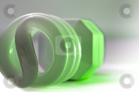 To use this stock image in your creative project, please select the size you need over to the right and click the "Add to Cart" button.
Your downloaded image will come with the Cutcaster watermark removed so don’t worry about the watermark you see on this page. Compact Fluorescent Glow stock photo, A green glowing compact fluorescent bulb. by Kevin Woodrow