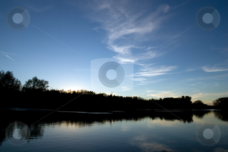 To use this stock image in your creative project, please select the size you need over to the right and click the "Add to Cart" button.
Your downloaded image will come with the Cutcaster watermark removed so don’t worry about the watermark you see on this page. Dusk reflection on the water stock photo, Dusk reflection on the water by Kevin Woodrow