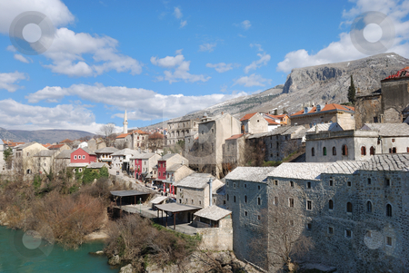 To use this stock image in your creative project, please select the size you need over to the right and click the "Add to Cart" button.
Your downloaded image will come with the Cutcaster watermark removed so don’t worry about the watermark you see on this page. Mostar Old Town stock photo, Mostar Old Town on a sunny winter day. by Denis Radovanovic
