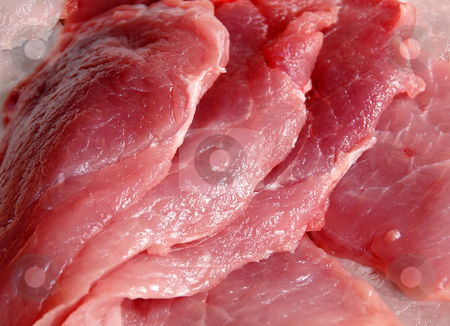 To use this stock image in your creative project, please select the size you need over to the right and click the "Add to Cart" button.
Your downloaded image will come with the Cutcaster watermark removed so don’t worry about the watermark you see on this page. Raw Meat stock photo, Raw red pork meat slices closeup background by Julija Sapic