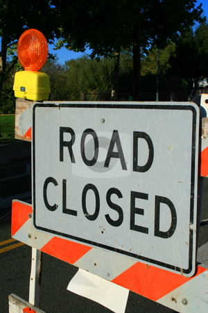 To use this stock image in your creative project, please select the size you need over to the right and click the "Add to Cart" button.
Your downloaded image will come with the Cutcaster watermark removed so don’t worry about the watermark you see on this page. Road Closed Sign stock photo, by Michael Felix