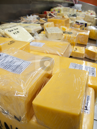 To use this stock image in your creative project, please select the size you need over to the right and click the "Add to Cart" button.
Your downloaded image will come with the Cutcaster watermark removed so don’t worry about the watermark you see on this page. Cheese Counter stock photo, A shot through the glass of a cheese counter. by Kevin Woodrow