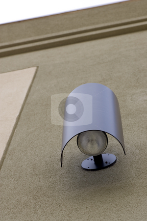 To use this stock image in your creative project, please select the size you need over to the right and click the "Add to Cart" button.
Your downloaded image will come with the Cutcaster watermark removed so don’t worry about the watermark you see on this page. Looking up at the light stock photo, An office building outdoor light fixture, surrounded by a stucco facade. by Kevin Woodrow