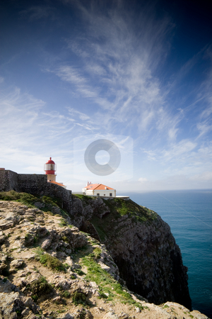 To use this stock image in your creative project, please select the size you need over to the right and click the "Add to Cart" button.
Your downloaded image will come with the Cutcaster watermark removed so don’t worry about the watermark you see on this page. Lighthouse on the cliffs stock photo, The lighthouse at Cape Saint Vincent, near Sagres, Portugal, historically known as the 'end of the world' by Kevin Woodrow