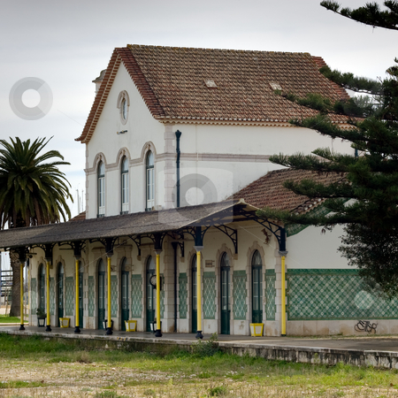 To use this stock image in your creative project, please select the size you need over to the right and click the "Add to Cart" button.
Your downloaded image will come with the Cutcaster watermark removed so don’t worry about the watermark you see on this page. Abandoned Railway Station stock photo, An abandoned railway station with open space in front, where railway tracks once sat. Lagos, Portugal. by Kevin Woodrow