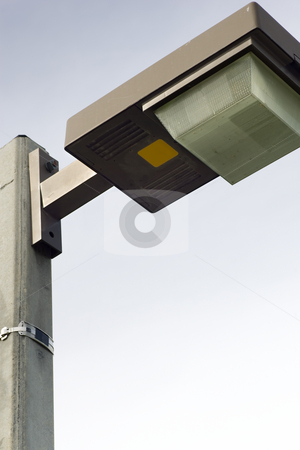 To use this stock image in your creative project, please select the size you need over to the right and click the "Add to Cart" button.
Your downloaded image will come with the Cutcaster watermark removed so don’t worry about the watermark you see on this page. Isolated Lamp Post Lighting stock photo, An isolated shot of the top of a lamp post, focus on the lamp casing, with a clear blue sky background by Kevin Woodrow