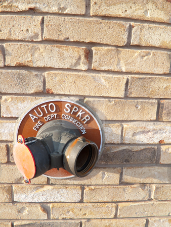 To use this stock image in your creative project, please select the size you need over to the right and click the "Add to Cart" button.
Your downloaded image will come with the Cutcaster watermark removed so don’t worry about the watermark you see on this page. Outdoor Sprinkler Connection stock photo, An outdoor sprinkler connection on the side of a building with a brick textured background. by Kevin Woodrow
