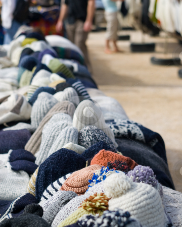 To use this stock image in your creative project, please select the size you need over to the right and click the "Add to Cart" button.
Your downloaded image will come with the Cutcaster watermark removed so don’t worry about the watermark you see on this page. Hat Lineup stock photo, A lineup of hats for sale at a local market. Cape Saint Vincent, Sagres, Portugal by Kevin Woodrow