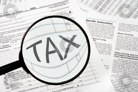 To use this stock image in your creative project, please select the size you need over to the right and click the "Add to Cart" button.
Your downloaded image will come with the Cutcaster watermark removed so don’t worry about the watermark you see on this page. Taxes stock photo, Federal tax forms under a magnifying glass. by Robert Byron