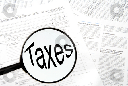 To use this stock image in your creative project, please select the size you need over to the right and click the "Add to Cart" button.
Your downloaded image will come with the Cutcaster watermark removed so don’t worry about the watermark you see on this page. Taxes stock photo, Federal tax forms under a magnifying glass. by Robert Byron