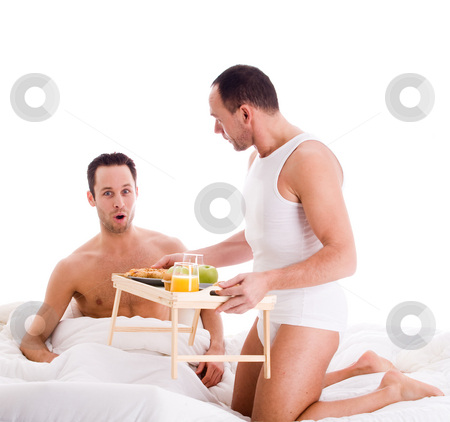 To use this stock image in your creative project, please select the size you need over to the right and click the "Add to Cart" button.
Your downloaded image will come with the Cutcaster watermark removed so don’t worry about the watermark you see on this page. Breakfast on bed stock photo, A Happy homo couple and their breakfast on a tray in bed by Frenk and Danielle Kaufmann