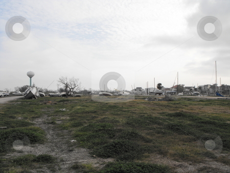 To use this stock image in your creative project, please select the size you need over to the right and click the "Add to Cart" button.
Your downloaded image will come with the Cutcaster watermark removed so don’t worry about the watermark you see on this page. Destroyed marina stock photo, Boats left on land after hurricane Ike destroyed a marina at Pleasure Island,Port Arthur ,Texas by Robert Brown