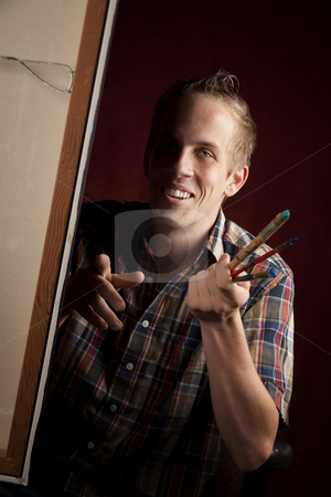 To use this stock image in your creative project, please select the size you need over to the right and click the "Add to Cart" button.
Your downloaded image will come with the Cutcaster watermark removed so don’t worry about the watermark you see on this page. Handsome young artist stock photo, Handsome young artist holding brushes by Scott Griessel
