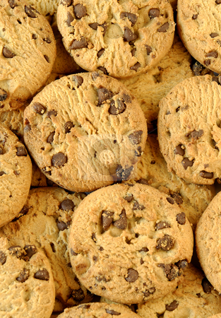 To use this stock image in your creative project, please select the size you need over to the right and click the "Add to Cart" button.
Your downloaded image will come with the Cutcaster watermark removed so don’t worry about the watermark you see on this page. Cookie background stock photo, A background of delicious chocolate chip cookies by Paul Turner