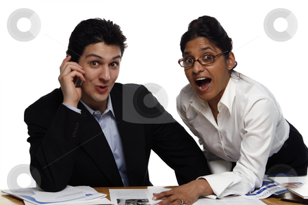 To use this stock image in your creative project, please select the size you need over to the right and click the "Add to Cart" button.
Your downloaded image will come with the Cutcaster watermark removed so don’t worry about the watermark you see on this page. Teamwork - Surprised stock photo, Businesswoman standing helping her male colleague who's seated. Both are looking at the camera. Shot horizontal isolated on white. by Orange Line Media