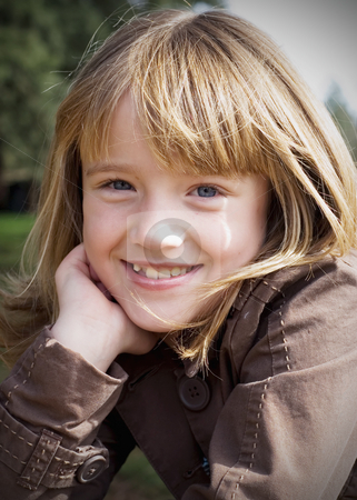 To use this stock image in your creative project, please select the size you need over to the right and click the "Add to Cart" button.
Your downloaded image will come with the Cutcaster watermark removed so don’t worry about the watermark you see on this page. Young Blonde Girl - Vertical stock photo, Cute blond girl sitting upright and smiling at the camera. Vertically framed shot. by Orange Line Media