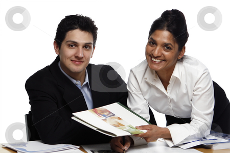 To use this stock image in your creative project, please select the size you need over to the right and click the "Add to Cart" button.
Your downloaded image will come with the Cutcaster watermark removed so don’t worry about the watermark you see on this page. Teamwork - Handing stock photo, Businesswoman standing helping her male colleague who's seated. Both are looking at the camera. Shot horizontal isolated on white. by Orange Line Media