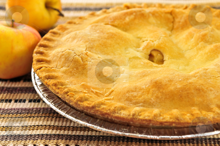 To use this stock image in your creative project, please select the size you need over to the right and click the "Add to Cart" button.
Your downloaded image will come with the Cutcaster watermark removed so don’t worry about the watermark you see on this page. Apple pie stock photo, Whole apple pie with apples close up by Elena Elisseeva