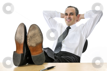 To use this stock image in your creative project, please select the size you need over to the right and click the "Add to Cart" button.
Your downloaded image will come with the Cutcaster watermark removed so don’t worry about the watermark you see on this page. Relaxing businessman stock photo, Relaxing businessman with feet up on his desk by Elena Elisseeva