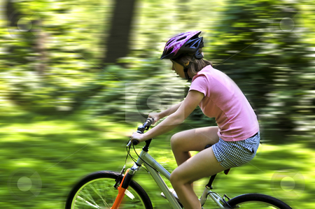 To use this stock image in your creative project, please select the size you need over to the right and click the "Add to Cart" button.
Your downloaded image will come with the Cutcaster watermark removed so don’t worry about the watermark you see on this page. Teenage girl on a bicycle stock photo, Portrait of a teenage girl riding a bicycle in summer park outdoors by Elena Elisseeva