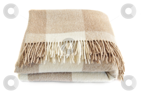 To use this stock image in your creative project, please select the size you need over to the right and click the "Add to Cart" button.
Your downloaded image will come with the Cutcaster watermark removed so don’t worry about the watermark you see on this page. Cozy alpaca wool blanket stock photo, Soft and warm folded alpaca wool blanket with fringe by Elena Elisseeva