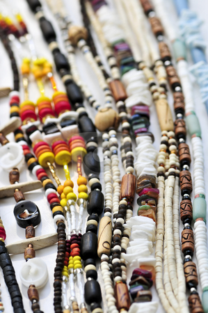 To use this stock image in your creative project, please select the size you need over to the right and click the "Add to Cart" button.
Your downloaded image will come with the Cutcaster watermark removed so don’t worry about the watermark you see on this page. Wood and seashell bead necklaces stock photo, Wood and seashell bead necklaces close up by Elena Elisseeva