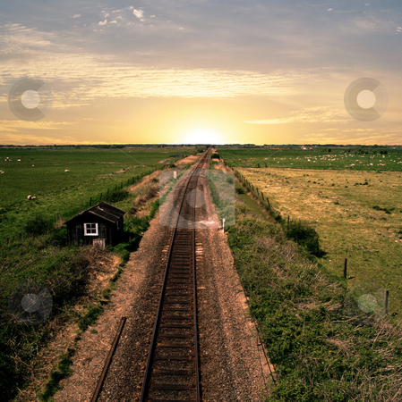 To use this stock image in your creative project, please select the size you need over to the right and click the "Add to Cart" button.
Your downloaded image will come with the Cutcaster watermark removed so don’t worry about the watermark you see on this page. Far and wide stock photo, Railway tracks in East Anglia UK by Paul Phillips
