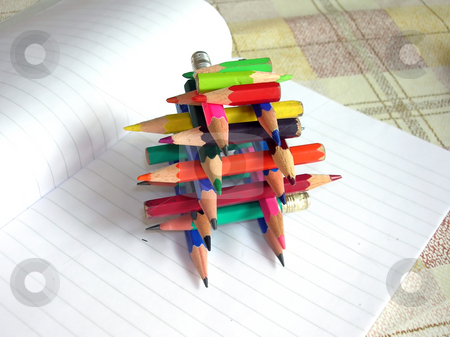 To use this stock image in your creative project, please select the size you need over to the right and click the "Add to Cart" button.
Your downloaded image will come with the Cutcaster watermark removed so don’t worry about the watermark you see on this page. Various small crayons stock photo, Multicolored various small crayons construction over notebook by Julija Sapic