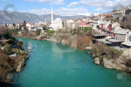 To use this stock image in your creative project, please select the size you need over to the right and click the "Add to Cart" button.
Your downloaded image will come with the Cutcaster watermark removed so don’t worry about the watermark you see on this page. Mosque in Mostar Old Town stock photo, Mosque in Mostar Old Town on a sunny winter day. by Denis Radovanovic