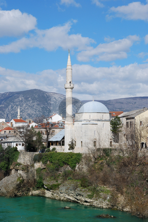 To use this stock image in your creative project, please select the size you need over to the right and click the "Add to Cart" button.
Your downloaded image will come with the Cutcaster watermark removed so don’t worry about the watermark you see on this page. Koski Mehmed Pasha Mosque in Mostar stock photo, Koski Mehmed Pasha Mosque in Mostar Old Town on a sunny winter day. by Denis Radovanovic