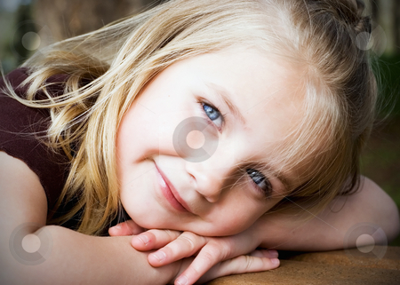 To use this stock image in your creative project, please select the size you need over to the right and click the "Add to Cart" button.
Your downloaded image will come with the Cutcaster watermark removed so don’t worry about the watermark you see on this page. Young Blonde Girl stock photo, Cute blond girl resting her head on her arms smiling at the camera by Orange Line Media
