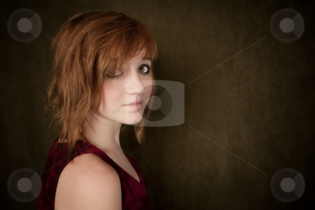 To use this stock image in your creative project, please select the size you need over to the right and click the "Add to Cart" button.
Your downloaded image will come with the Cutcaster watermark removed so don’t worry about the watermark you see on this page. Young girl on a green background stock photo, Pretty young girl with red hair on a green background by Scott Griessel