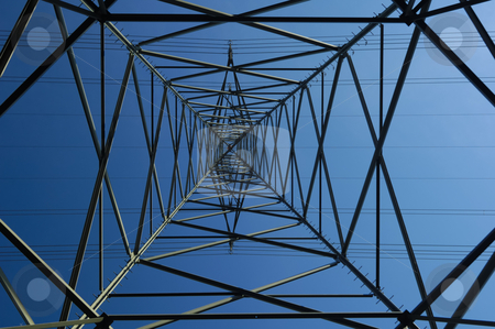 To use this stock image in your creative project, please select the size you need over to the right and click the "Add to Cart" button.
Your downloaded image will come with the Cutcaster watermark removed so don’t worry about the watermark you see on this page. Metal web. stock photo, Inside an electricity pylon looking directly up at the clear blue sky. It is as if the pylon forms a metal spider's web. A tiny aeroplane seems to be caught in the bottom left corner. by Alistair Scott