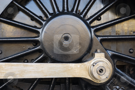To use this stock image in your creative project, please select the size you need over to the right and click the "Add to Cart" button.
Your downloaded image will come with the Cutcaster watermark removed so don’t worry about the watermark you see on this page. Steam locomotive wheel stock photo, Steam locomotive wheel and coupling rods by Peter Cox