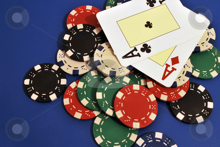 To use this stock image in your creative project, please select the size you need over to the right and click the "Add to Cart" button.
Your downloaded image will come with the Cutcaster watermark removed so don’t worry about the watermark you see on this page. Poker Chips stock photo, Casino chips on a blue background and ace card in Vegas by Tudor Antonel adrian