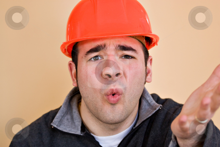 To use this stock image in your creative project, please select the size you need over to the right and click the "Add to Cart" button.
Your downloaded image will come with the Cutcaster watermark removed so don’t worry about the watermark you see on this page. Frustrated Construction Worker stock photo, This construction worker is frustrated and confused about something. by Todd Arena