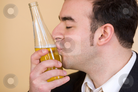 To use this stock image in your creative project, please select the size you need over to the right and click the "Add to Cart" button.
Your downloaded image will come with the Cutcaster watermark removed so don’t worry about the watermark you see on this page. In Love With Beer stock photo, This young man really loves drinking beer. by Todd Arena
