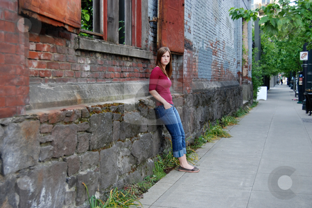 To use this stock image in your creative project, please select the size you need over to the right and click the "Add to Cart" button.
Your downloaded image will come with the Cutcaster watermark removed so don’t worry about the watermark you see on this page. Teen Leaning Against Wall stock photo, Outdoor shot of a teenage girl with her hands in her pockets leaning against a brick and stone wall. by Orange Line Media