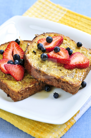 To use this stock image in your creative project, please select the size you need over to the right and click the "Add to Cart" button.
Your downloaded image will come with the Cutcaster watermark removed so don’t worry about the watermark you see on this page. French toast stock photo, Breakfast of french toast with fresh berries and maple syrup by Elena Elisseeva