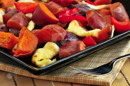 To use this stock image in your creative project, please select the size you need over to the right and click the "Add to Cart" button.
Your downloaded image will come with the Cutcaster watermark removed so don’t worry about the watermark you see on this page. Roasted sweet potatoes stock photo, Vegetarian dish of roasted yams with cheese and peppers by Elena Elisseeva
