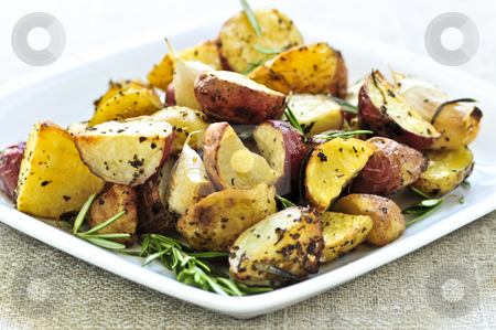 To use this stock image in your creative project, please select the size you need over to the right and click the "Add to Cart" button.
Your downloaded image will come with the Cutcaster watermark removed so don’t worry about the watermark you see on this page. Roasted potatoes stock photo, Herb roasted potatoes served on a plate by Elena Elisseeva