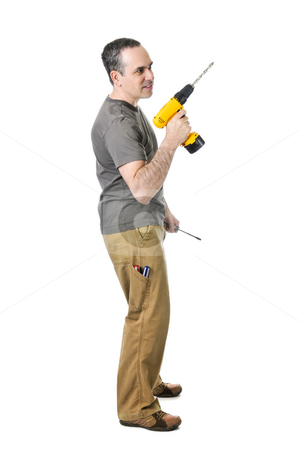 To use this stock image in your creative project, please select the size you need over to the right and click the "Add to Cart" button.
Your downloaded image will come with the Cutcaster watermark removed so don’t worry about the watermark you see on this page. Handyman with a drill and screwdriver stock photo, Confident handyman holding a drill and screwdriver by Elena Elisseeva